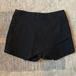 Black envelope skirt. Gab Kate